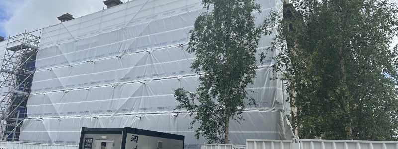 Market Hall building with scaffold and wrap