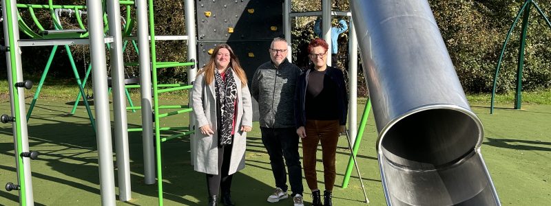 Three Councillors, slide and play equipment in background