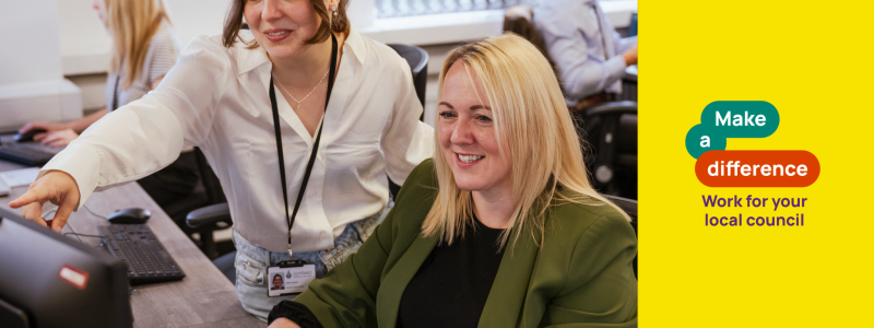 Two people working together at a desk in an office, with one pointing at the computer screen and a “Make a difference – Work for your local council” graphic on the right.