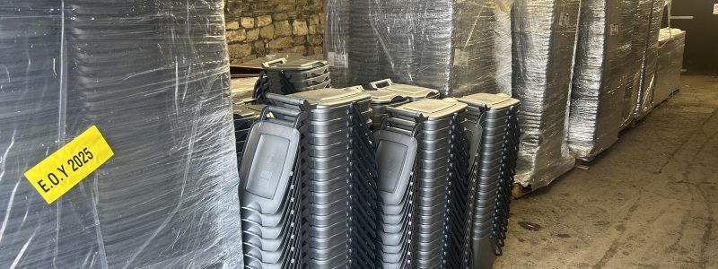 Food waste caddies in storage