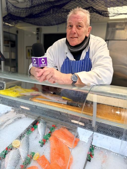 Person at a fish stall