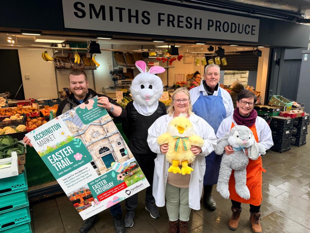 People at a fruit and veg stall