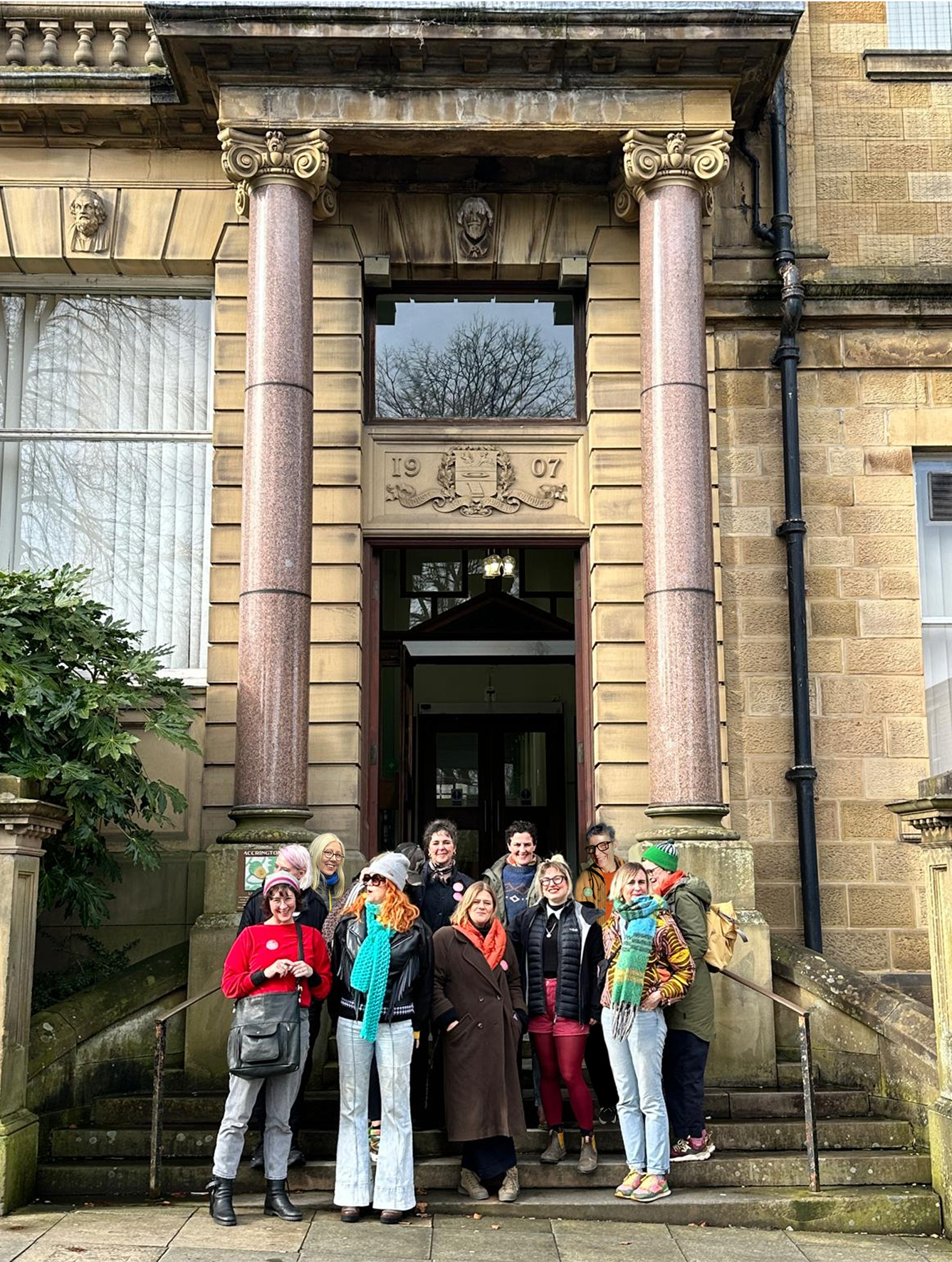 Group of people outside library building
