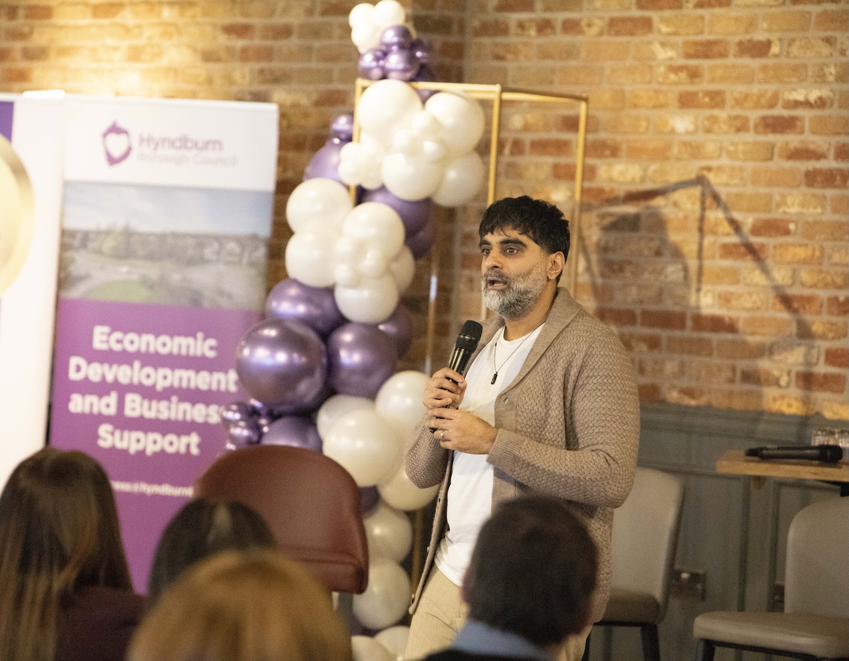 Person holding microphone