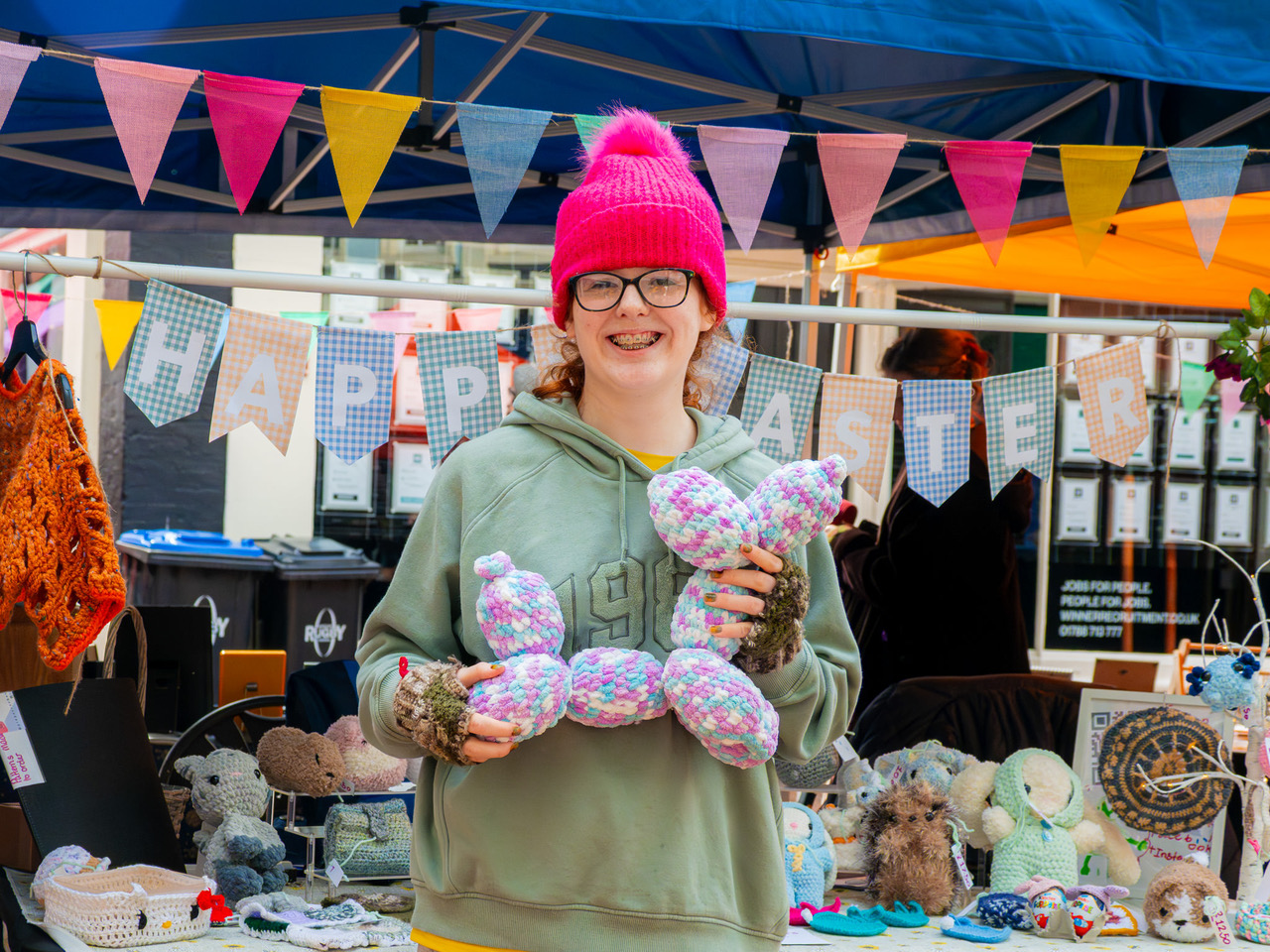 Person holding knitted animal toy